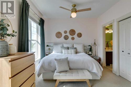 134 West Springs Road Sw, Calgary, AB - Indoor Photo Showing Bedroom