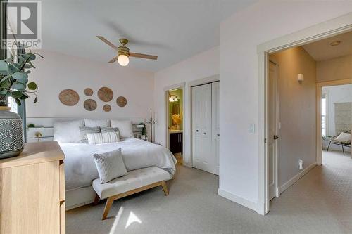 134 West Springs Road Sw, Calgary, AB - Indoor Photo Showing Bedroom