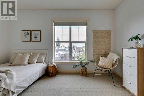 134 West Springs Road Sw, Calgary, AB - Indoor Photo Showing Bedroom