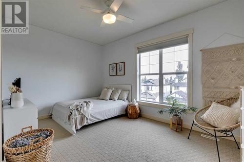 134 West Springs Road Sw, Calgary, AB - Indoor Photo Showing Bedroom