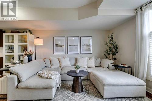 134 West Springs Road Sw, Calgary, AB - Indoor Photo Showing Living Room