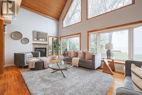 128 Moores Beach Road, Georgina, ON - Indoor Photo Showing Living Room With Fireplace