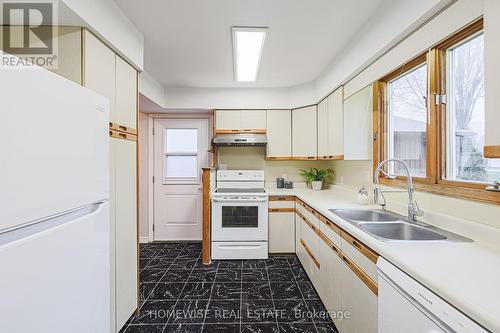 128 Moores Beach Road, Georgina, ON - Indoor Photo Showing Kitchen With Double Sink