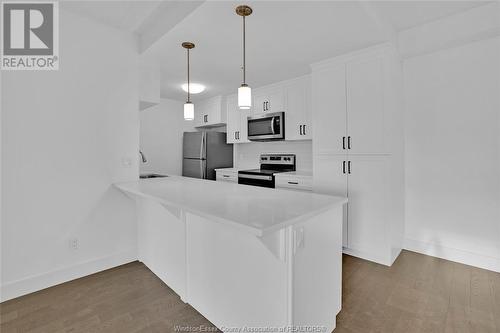 4578 Huron Church Line Road Unit# 509, Lasalle, ON - Indoor Photo Showing Kitchen With Upgraded Kitchen