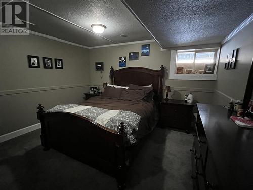 27 Pioneer Way, Fort Nelson, BC - Indoor Photo Showing Bedroom