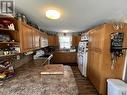 27 Pioneer Way, Fort Nelson, BC  - Indoor Photo Showing Kitchen With Double Sink 