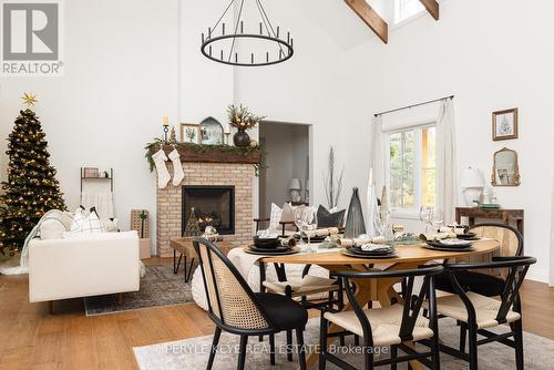 303 Clearwater Lake Road, Huntsville, ON - Indoor Photo Showing Dining Room With Fireplace