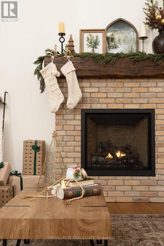 303 Clearwater Lake Road, Huntsville, ON - Indoor Photo Showing Living Room With Fireplace