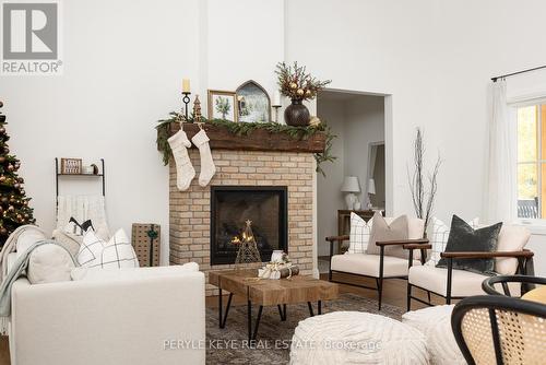 303 Clearwater Lake Road, Huntsville, ON - Indoor Photo Showing Living Room With Fireplace