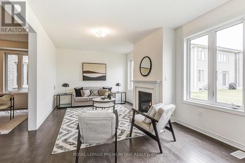 447 Black Cherry Crescent, Shelburne, ON - Indoor Photo Showing Living Room With Fireplace