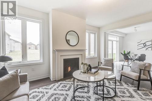 447 Black Cherry Crescent, Shelburne, ON - Indoor Photo Showing Living Room With Fireplace