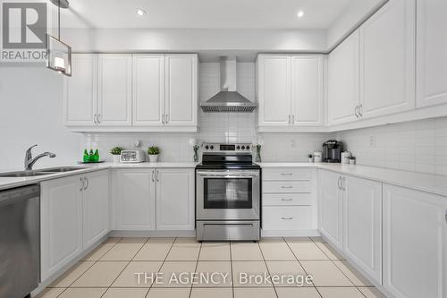 276 Fasken Court, Milton, ON - Indoor Photo Showing Kitchen With Double Sink