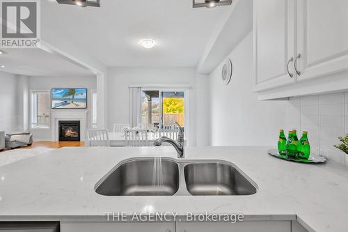 276 Fasken Court, Milton, ON - Indoor Photo Showing Kitchen With Double Sink