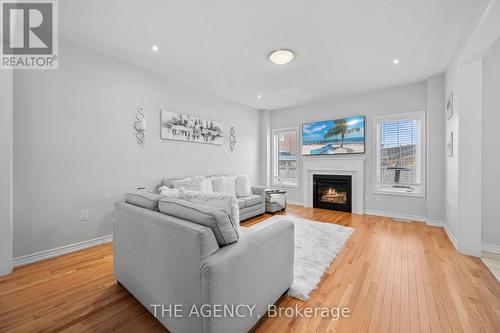 276 Fasken Court, Milton, ON - Indoor Photo Showing Living Room With Fireplace