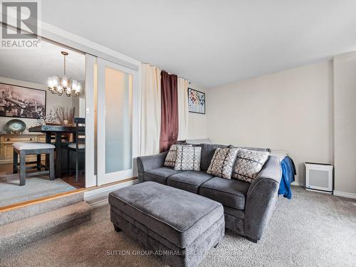 502 - 31 Four Winds Drive, Toronto, ON - Indoor Photo Showing Living Room