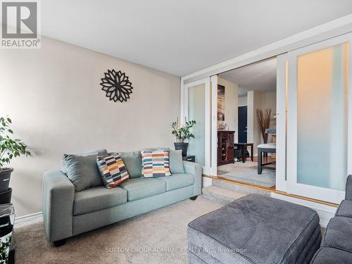 502 - 31 Four Winds Drive, Toronto, ON - Indoor Photo Showing Living Room