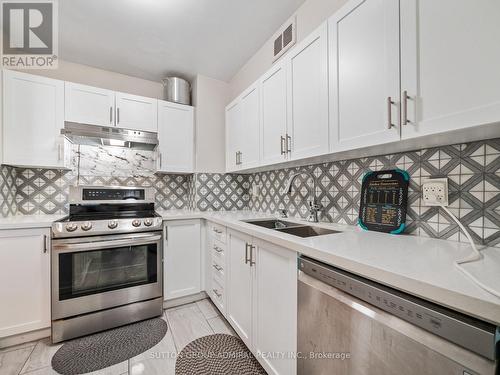 502 - 31 Four Winds Drive, Toronto, ON - Indoor Photo Showing Kitchen With Stainless Steel Kitchen With Double Sink