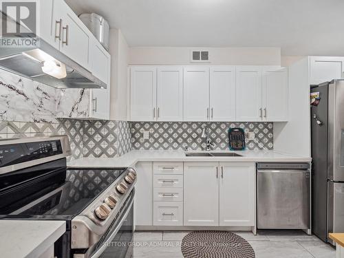 502 - 31 Four Winds Drive, Toronto, ON - Indoor Photo Showing Kitchen With Stainless Steel Kitchen With Double Sink