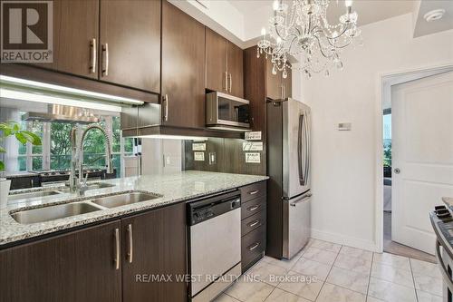 308 - 60 Absolute Avenue, Mississauga, ON - Indoor Photo Showing Kitchen With Stainless Steel Kitchen With Double Sink With Upgraded Kitchen