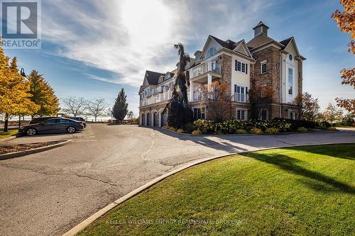 202 - 395 Lakebreeze Drive, Clarington (Newcastle), ON - Outdoor With Facade