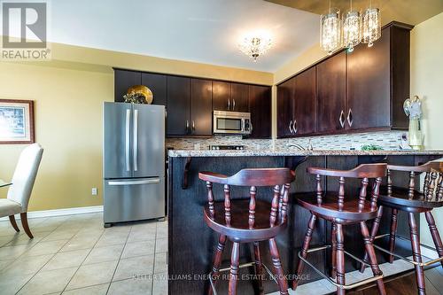 202 - 395 Lakebreeze Drive, Clarington (Newcastle), ON - Indoor Photo Showing Kitchen With Stainless Steel Kitchen With Upgraded Kitchen