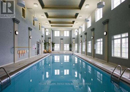 202 - 395 Lakebreeze Drive, Clarington (Newcastle), ON - Indoor Photo Showing Other Room With In Ground Pool