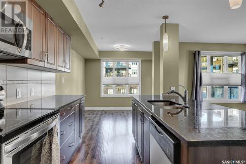 205 5303 Universal Crescent, Regina, SK - Indoor Photo Showing Kitchen With Double Sink With Upgraded Kitchen