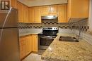 907 - 23 Lorraine Drive, Toronto, ON  - Indoor Photo Showing Kitchen With Double Sink 