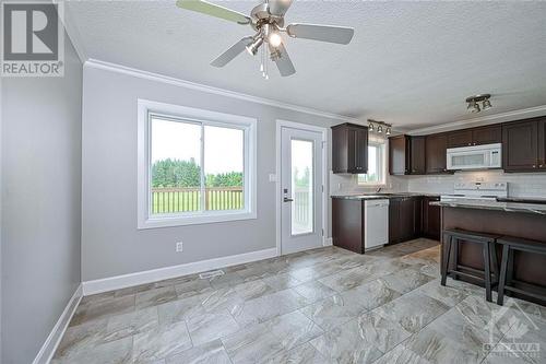 Large, bright eat-in area with access to deck - 618 Latimer Road, South Mountain, ON - Indoor Photo Showing Kitchen