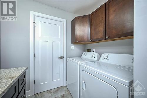 Main level laundry - 618 Latimer Road, South Mountain, ON - Indoor Photo Showing Laundry Room