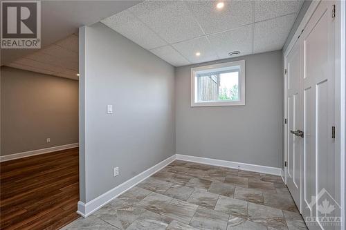 Landing at bottom of stairs w/large closets - 618 Latimer Road, South Mountain, ON - Indoor Photo Showing Other Room