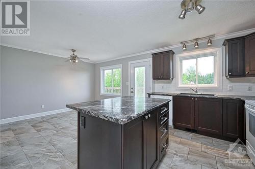 Bright spacious kitchen with island - 618 Latimer Road, South Mountain, ON - Indoor Photo Showing Kitchen