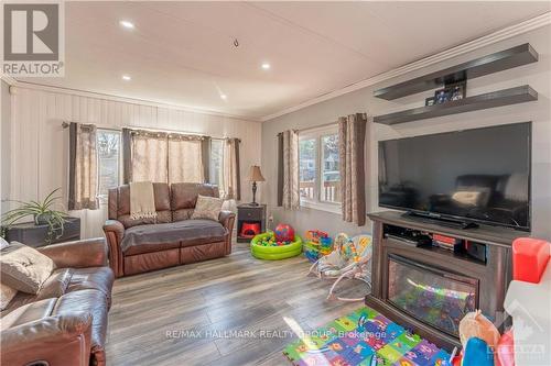 3 - 307 Front Road, Champlain, ON - Indoor Photo Showing Living Room With Fireplace