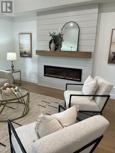 148 Foxborough Place, Thames Centre (Thorndale), ON - Indoor Photo Showing Living Room With Fireplace