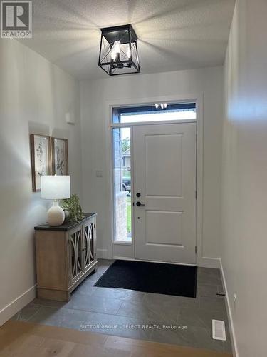 FRONT FOYER - 148 Foxborough Place, Thames Centre (Thorndale), ON - Indoor Photo Showing Other Room