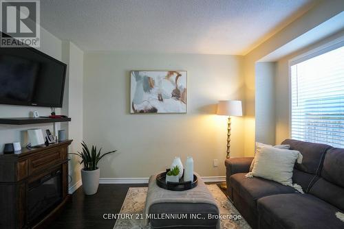 37 - 64 Brisbane Court, Brampton, ON - Indoor Photo Showing Living Room With Fireplace