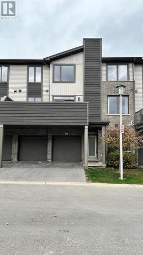 27 - 1960 Dalmagarry Road, London, ON - Outdoor With Facade