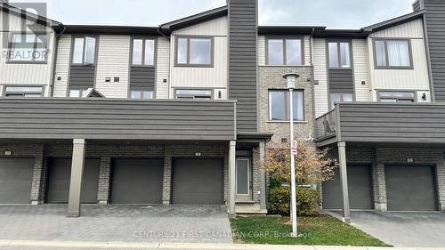 27 - 1960 Dalmagarry Road, London, ON - Outdoor With Facade