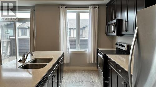 27 - 1960 Dalmagarry Road, London, ON - Indoor Photo Showing Kitchen With Double Sink With Upgraded Kitchen