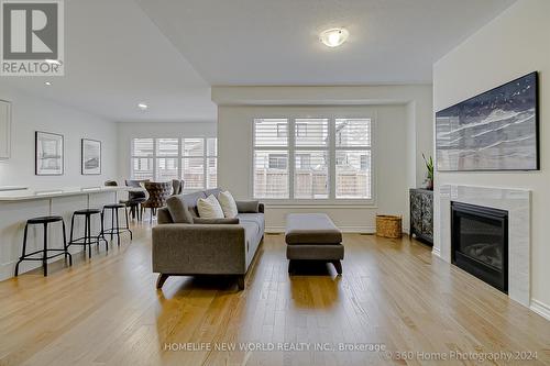 72 Souter Drive, Whitby, ON - Indoor Photo Showing Living Room With Fireplace