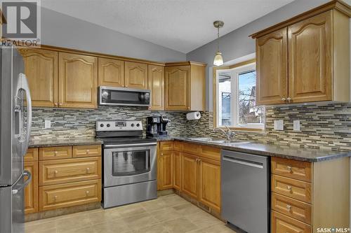 1452 Benjamin Crescent N, Regina, SK - Indoor Photo Showing Kitchen With Double Sink