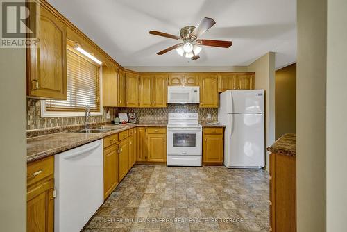 20 First Avenue, Prince Edward County (Wellington), ON - Indoor Photo Showing Kitchen With Double Sink