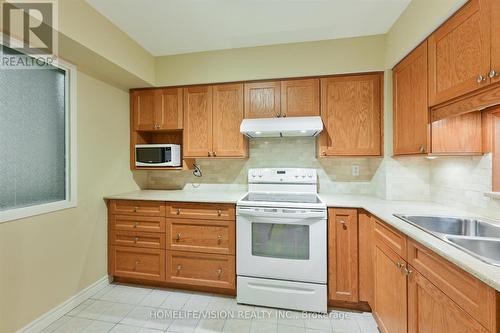 308 - 115 Bonis Avenue, Toronto, ON - Indoor Photo Showing Kitchen With Double Sink