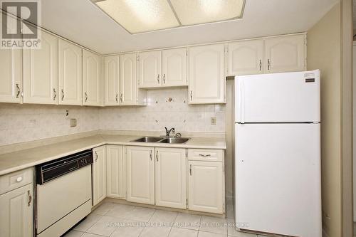 908 - 20 Dean Park Road, Toronto, ON - Indoor Photo Showing Kitchen With Double Sink