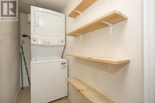 908 - 20 Dean Park Road, Toronto, ON - Indoor Photo Showing Laundry Room