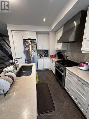 65 Harold Lawrie Lane, Markham, ON - Indoor Photo Showing Kitchen With Double Sink