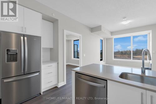 310 - 3220 William Coltson Avenue, Oakville, ON - Indoor Photo Showing Kitchen