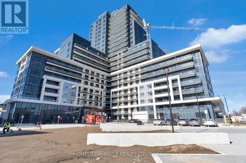 310 - 3220 William Coltson Avenue, Oakville, ON - Outdoor With Balcony With Facade