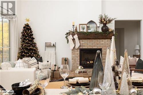 303 Clearwater Lake Road, Huntsville, ON - Indoor Photo Showing Living Room With Fireplace