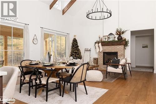 303 Clearwater Lake Road, Huntsville, ON - Indoor Photo Showing Dining Room With Fireplace